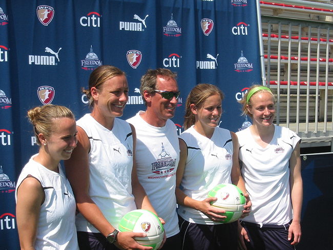 From the 2010 Washington Freedom media day: Gabarra with players Caitlin Miskel, Abby Wambach, Cat Whitehill, and Becky Sauerbrunn.